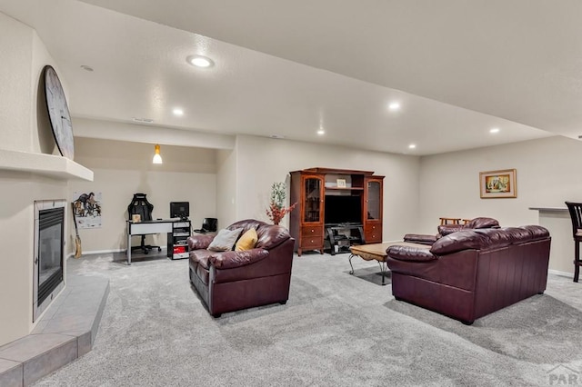 living area with a fireplace, baseboards, recessed lighting, and light colored carpet
