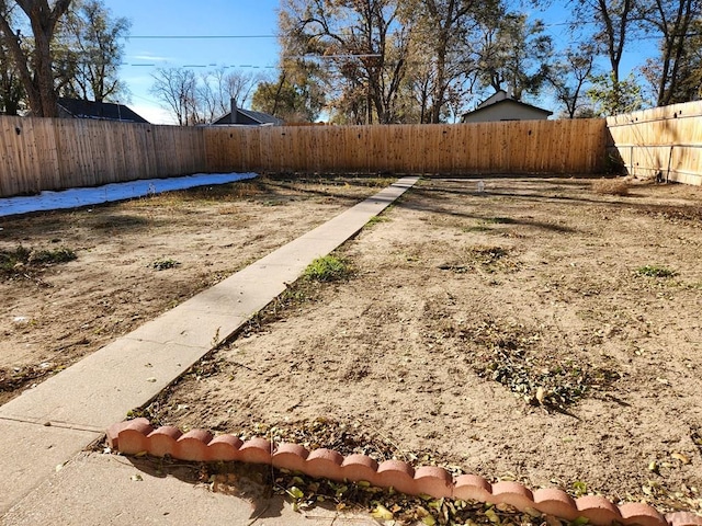 view of yard featuring a fenced backyard