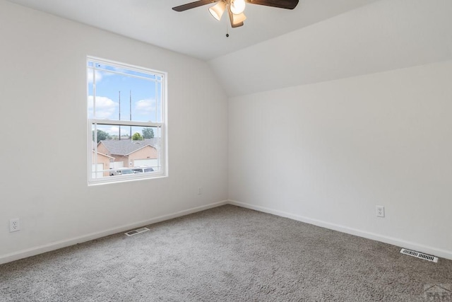 2330 Inspiration Ln, Pueblo, CO 81008 - bonus room featuring a ceiling fan, carpet, vaulted ceiling, and baseboards
