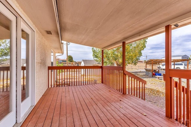 wooden deck with visible vents