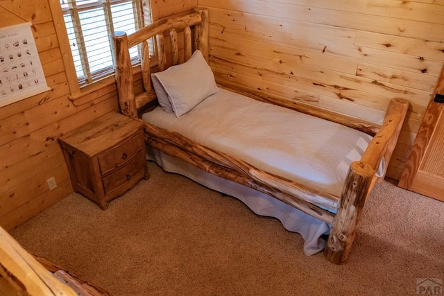 317 Parsons Rd, La Veta, CO 81055 - carpeted bedroom featuring wood walls
