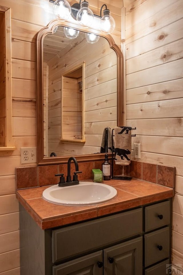 317 Parsons Rd, La Veta, CO 81055 - bathroom with wooden walls and vanity