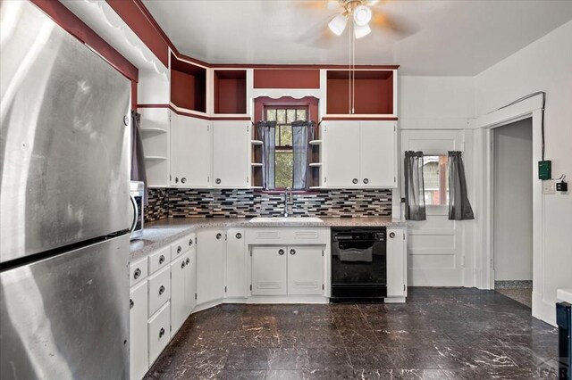 423 Washington St, Pueblo, CO 81004 - kitchen featuring freestanding refrigerator, open shelves, dishwasher, and a sink