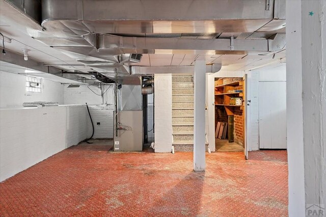 423 Washington St, Pueblo, CO 81004 - unfinished basement featuring heating unit