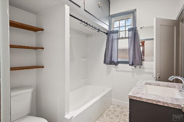 423 Washington St, Pueblo, CO 81004 - bathroom featuring vanity, toilet, and shower / bathtub combination