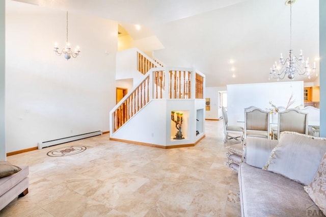 living room with a chandelier, stairway, baseboard heating, and baseboards