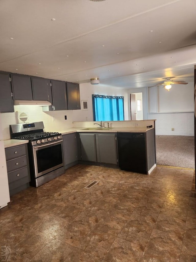 kitchen featuring gray cabinetry, a peninsula, a sink, stainless steel range with gas cooktop, and dishwasher