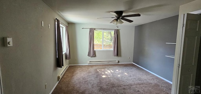 unfurnished bedroom featuring carpet, baseboards, ceiling fan, and baseboard heating