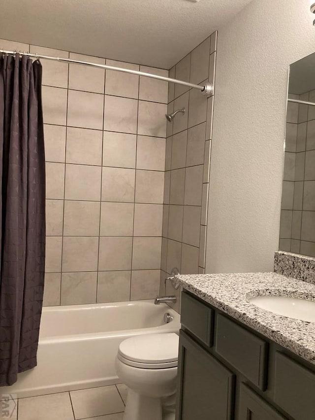 47 S Jibbsam Way, Pueblo West, CO 81007 - bathroom featuring vanity, a textured wall, tile patterned floors, shower / bath combo, and a textured ceiling