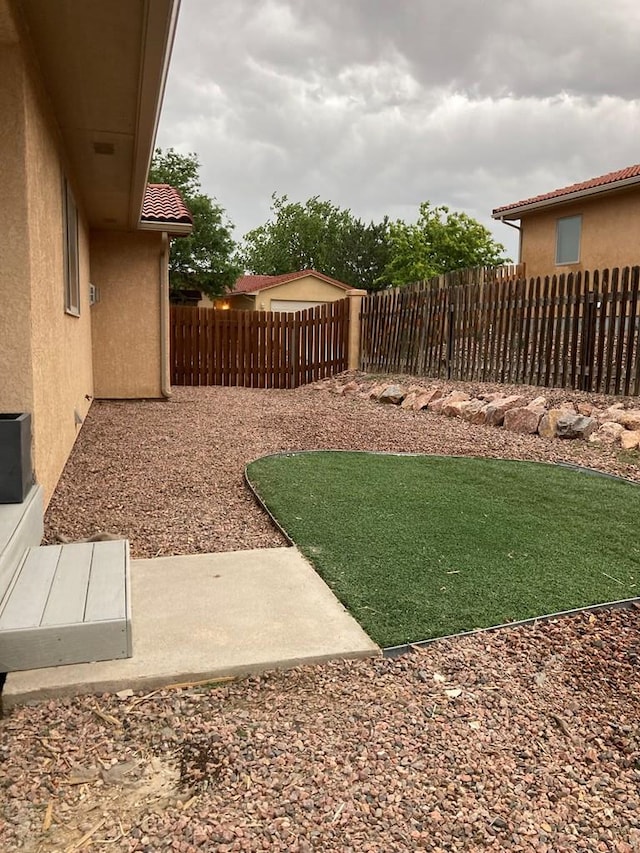 47 S Jibbsam Way, Pueblo West, CO 81007 - view of yard with a patio