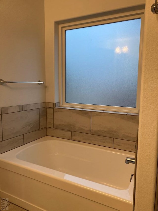 47 S Jibbsam Way, Pueblo West, CO 81007 - bathroom featuring a garden tub