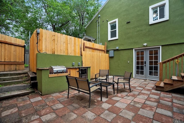 411 Olive St, Colorado Springs, CO 80904 - view of patio / terrace featuring beverage cooler and french doors