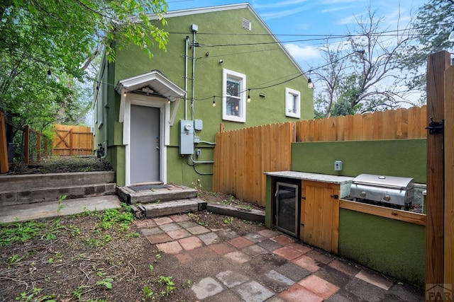 411 Olive St, Colorado Springs, CO 80904 - view of patio featuring grilling area and wine cooler