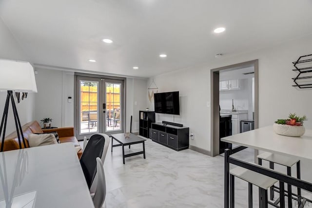 411 Olive St, Colorado Springs, CO 80904 - living room featuring french doors and recessed lighting