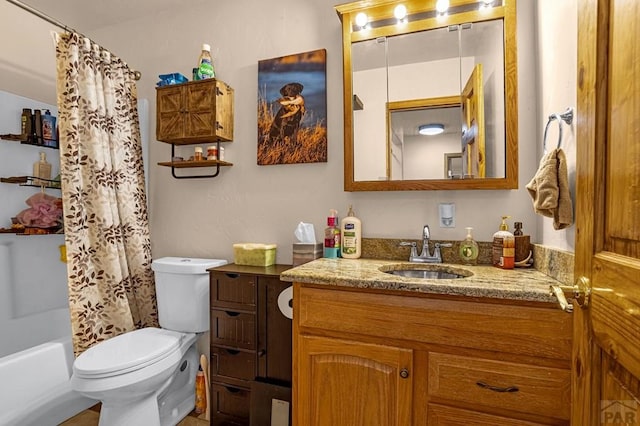 full bathroom with vanity, toilet, and shower / bath combo