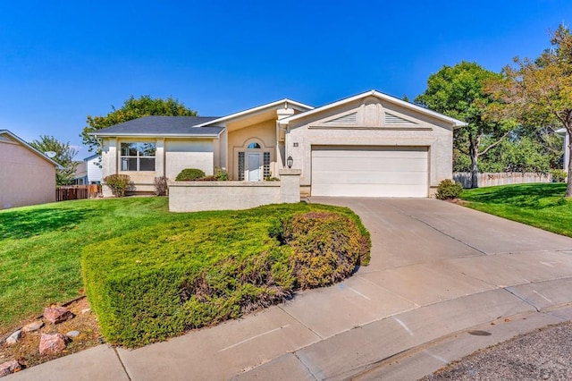 ranch-style house featuring a garage, fence, a front lawn, and concrete driveway