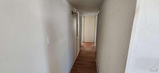 hallway featuring wood finished floors