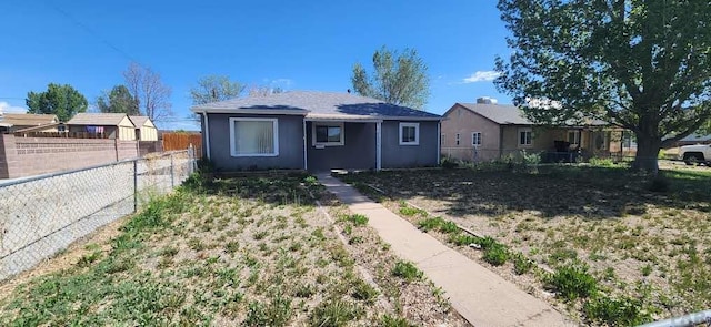 view of front of property featuring a fenced backyard