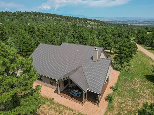 bird's eye view with a view of trees