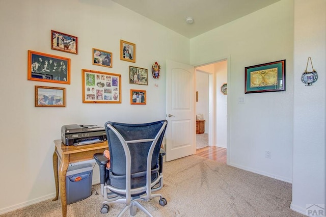 office area featuring carpet floors and baseboards