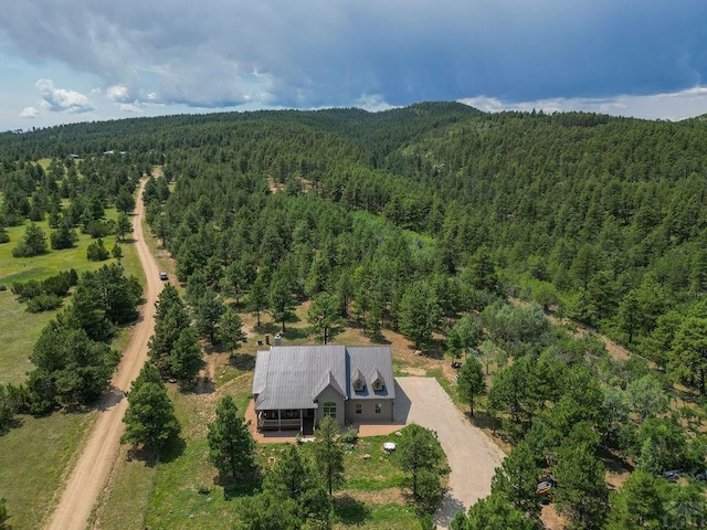 aerial view featuring a view of trees