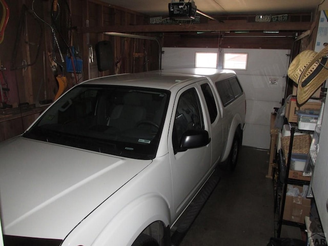1520 Lexington Rd, Pueblo, CO 81001 - garage featuring independent washer and dryer and a garage door opener