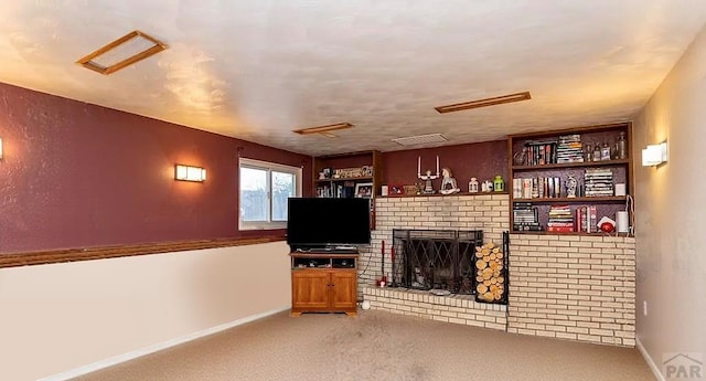 unfurnished living room with carpet floors, a brick fireplace, and baseboards