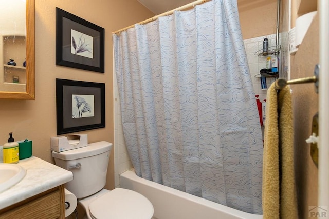 full bathroom with toilet, shower / tub combo, and vanity