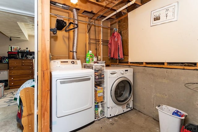 laundry area with laundry area and washer and dryer