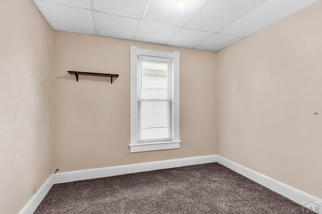 935 Spruce St, Pueblo, CO 81005 - empty room with carpet floors and a drop ceiling