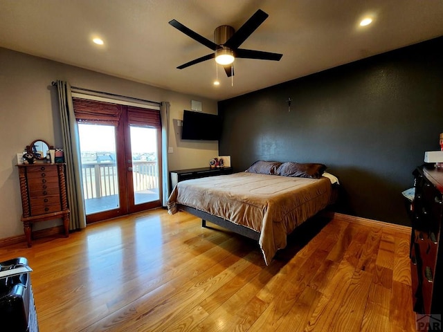 1044 S Los Charros Dr, Pueblo West, CO 81007 - bedroom featuring light wood finished floors, recessed lighting, baseboards, and access to outside