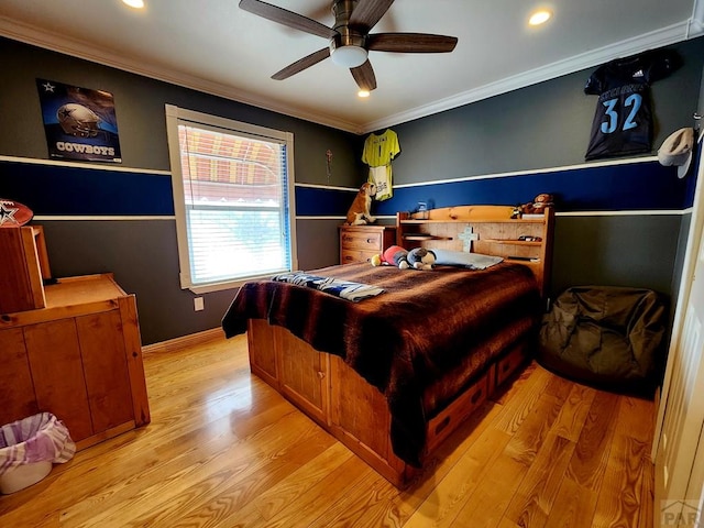 1044 S Los Charros Dr, Pueblo West, CO 81007 - bedroom with light wood-type flooring, recessed lighting, crown molding, baseboards, and ceiling fan