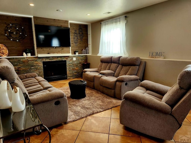 1044 S Los Charros Dr, Pueblo West, CO 81007 - living room featuring tile patterned floors, recessed lighting, a fireplace, and visible vents