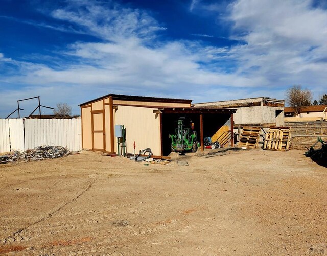 1044 S Los Charros Dr, Pueblo West, CO 81007 - view of outbuilding with an outbuilding and fence