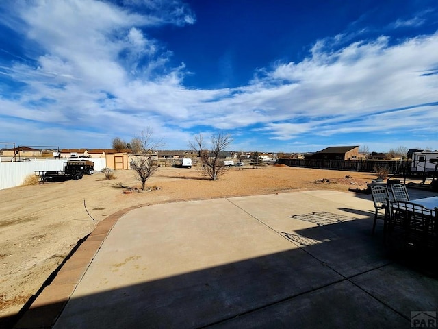 1044 S Los Charros Dr, Pueblo West, CO 81007 - view of patio / terrace with a fenced backyard