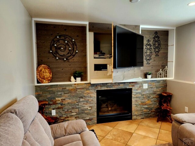 1044 S Los Charros Dr, Pueblo West, CO 81007 - living area with tile patterned flooring and a fireplace
