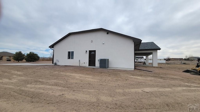 view of home's exterior with cooling unit