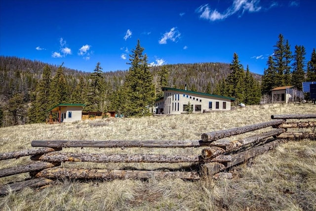 1441 Forest Rd Unit 507 1A, Creede, CO 81130 - back of property with a forest view and a mountain view