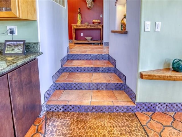 1441 Forest Rd Unit 507 1A, Creede, CO 81130 - stairs featuring tile patterned flooring