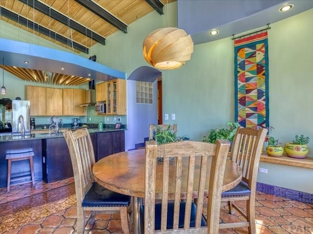 1441 Forest Rd Unit 507 1A, Creede, CO 81130 - tiled dining space with wood ceiling with exposed beams, high vaulted ceiling, and recessed lighting