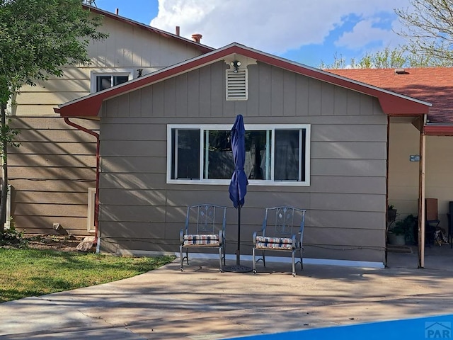 rear view of property with a patio