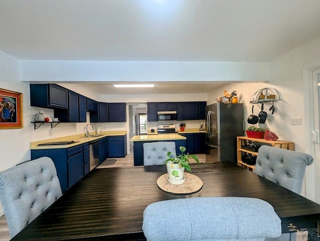 empty room featuring visible vents, a textured ceiling, dark wood finished floors, and baseboards