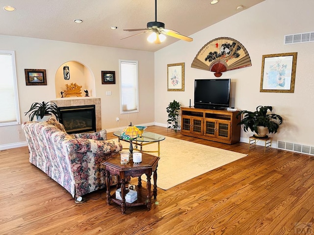 living area with recessed lighting, baseboards, a ceiling fan, and wood finished floors