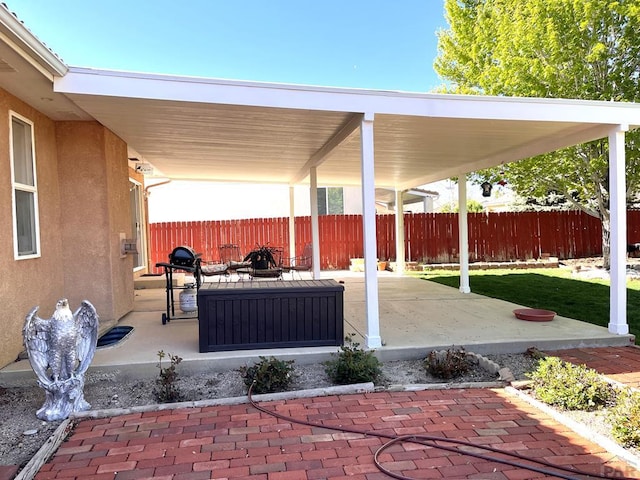 view of patio with fence