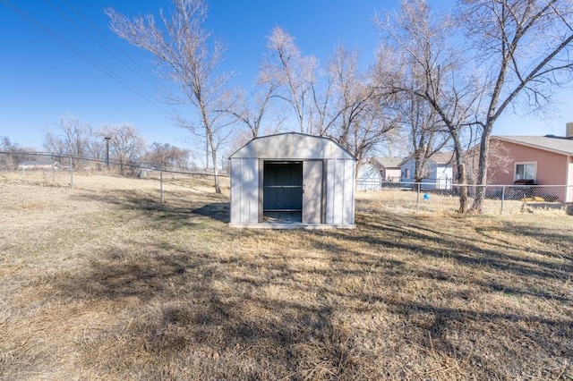 view of shed featuring a fenced backyard