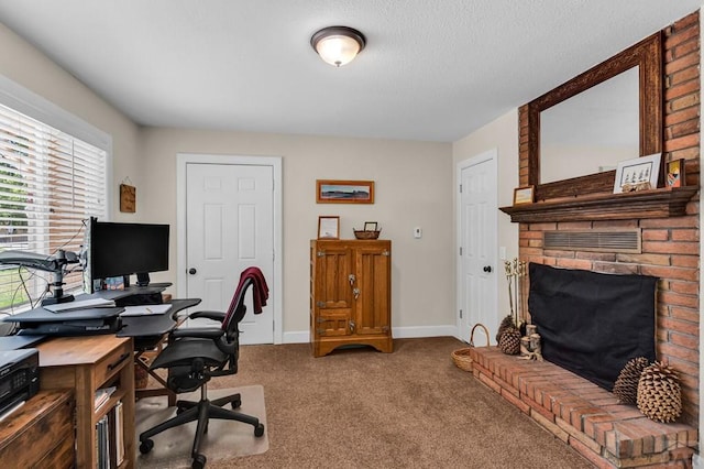1215 Greenwood Ave, Canon City, CO 81212 - carpeted office space with baseboards and a fireplace