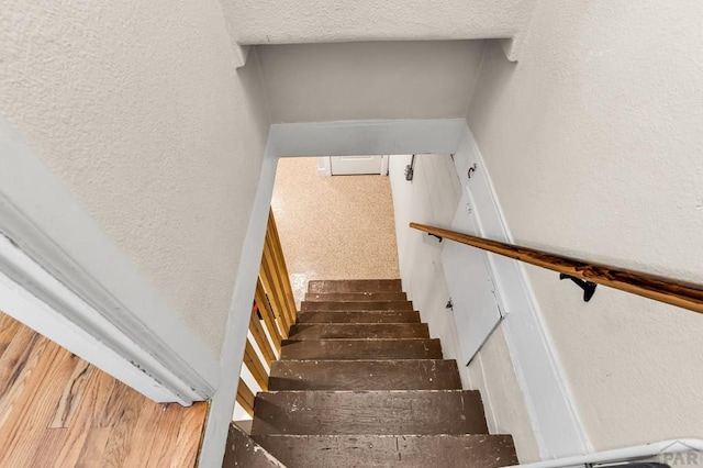 1215 Greenwood Ave, Canon City, CO 81212 - staircase featuring a textured wall