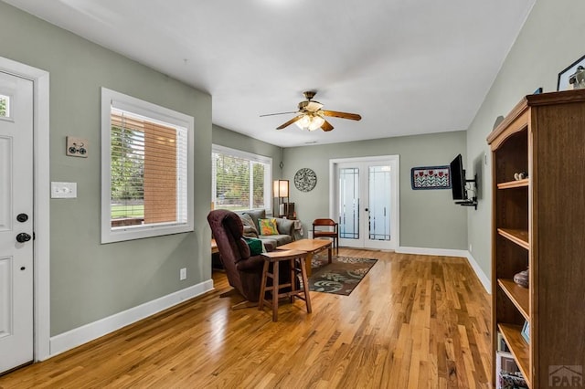 1215 Greenwood Ave, Canon City, CO 81212 - living area with a ceiling fan, light wood finished floors, and french doors