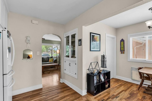 1215 Greenwood Ave, Canon City, CO 81212 - entryway with arched walkways and wood finished floors