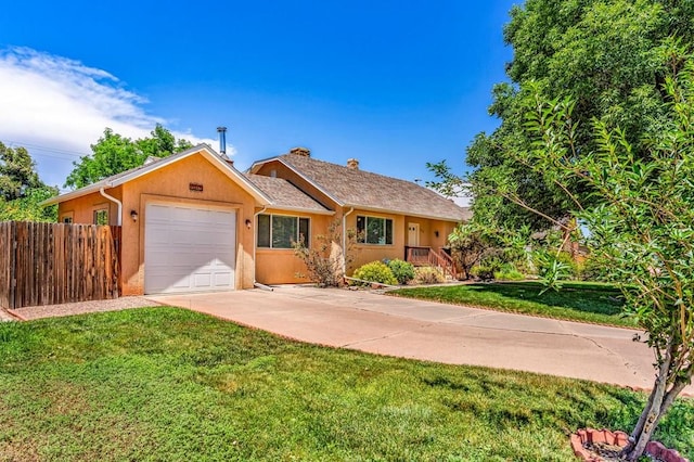 1215 Greenwood Ave, Canon City, CO 81212 - ranch-style home featuring an attached garage, driveway, stucco siding, and a chimney